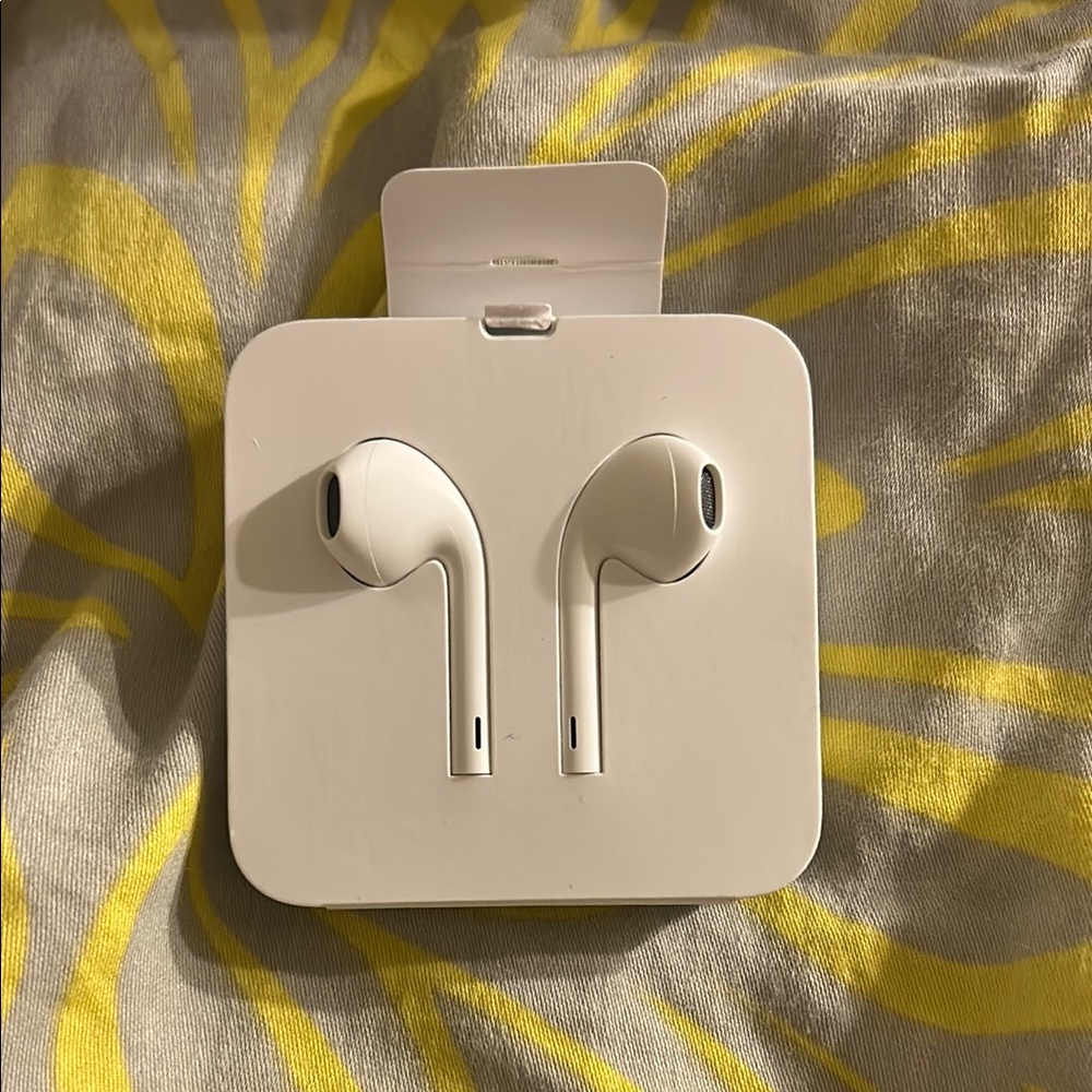 Apple White Wired Earbuds with Long Stems and Rounded Ear Pieces
